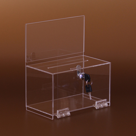 Die Spendebox mit einem Zylinderschloss, in das Topschild kann ein Blatt mit Infomaterial eingeschoben werden.